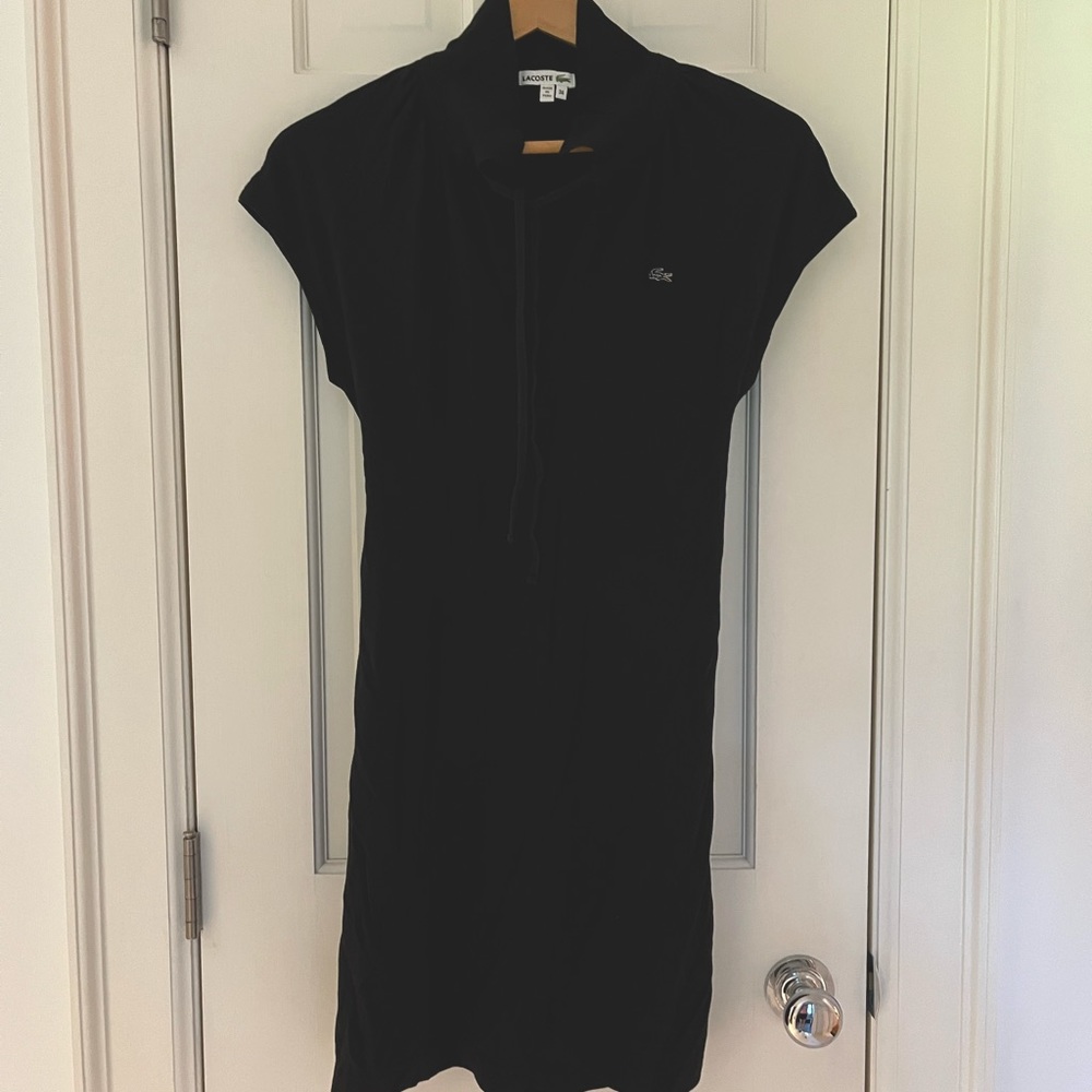 Lacoste women’s black stretch cotton pique polo dress, size small / 34.